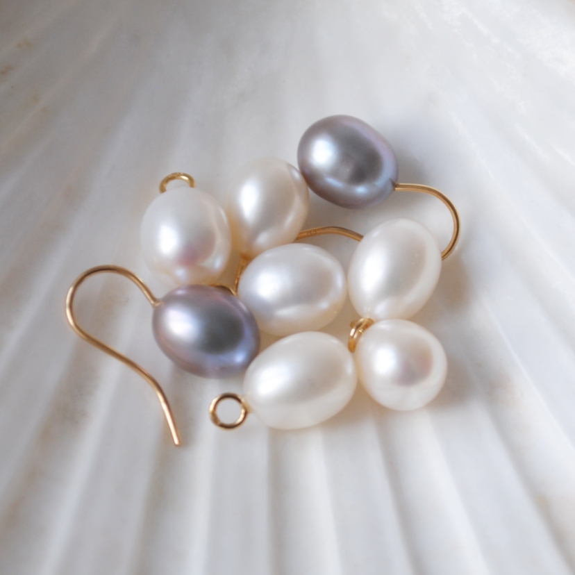 pearl earrings in a shell 