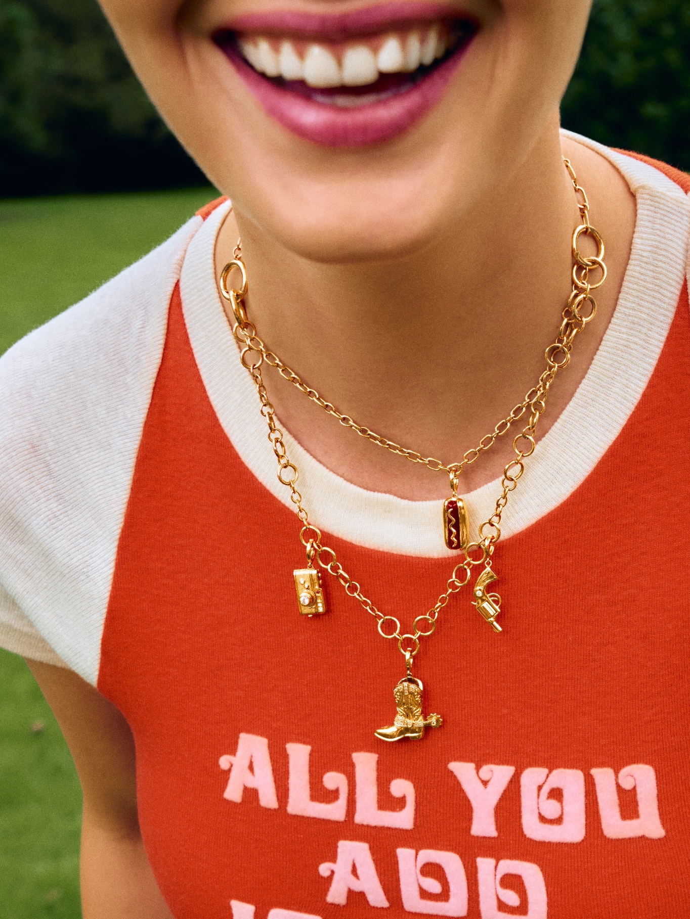 woman wearing charm necklace