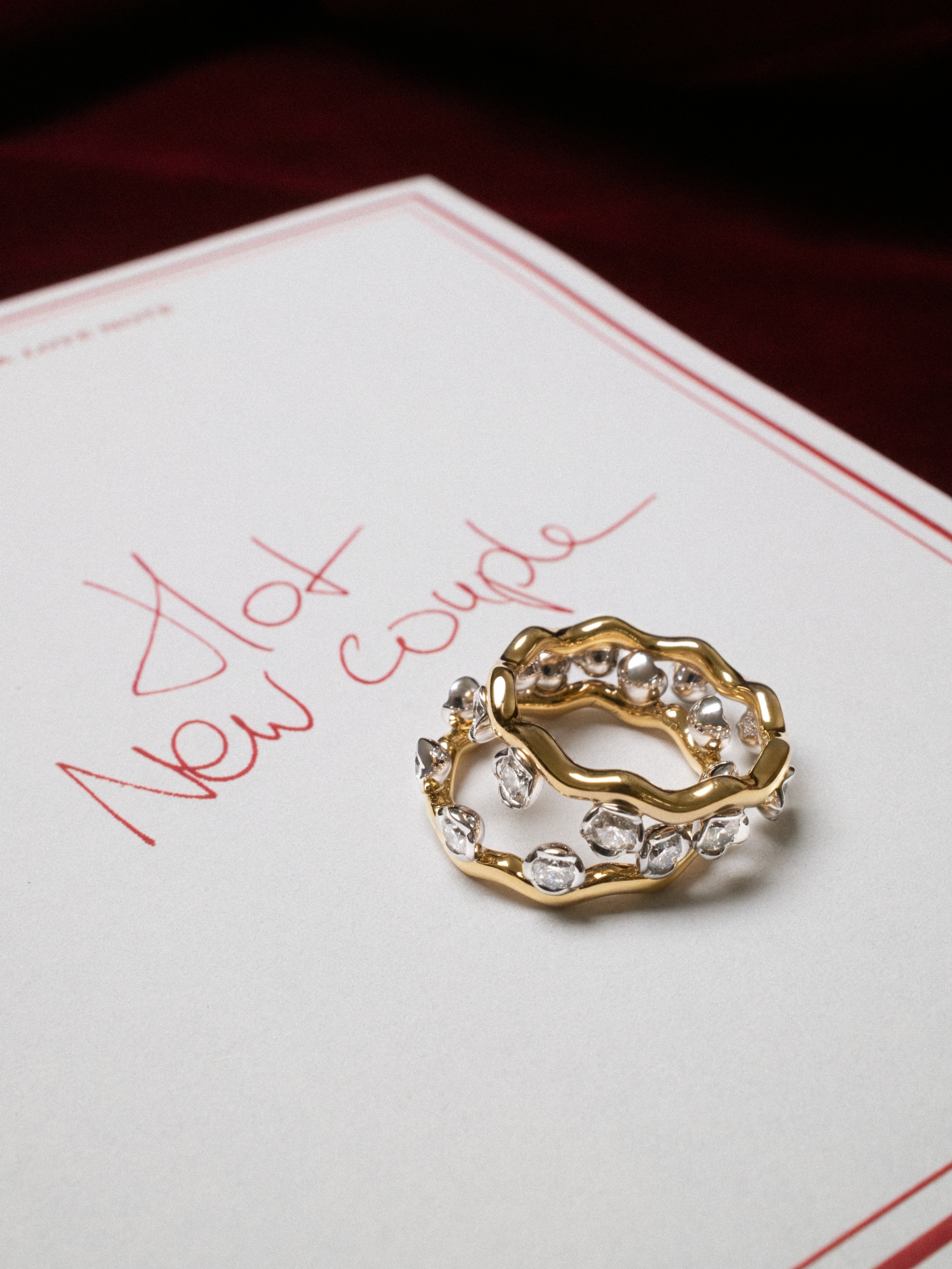 gold and diamond rings with note